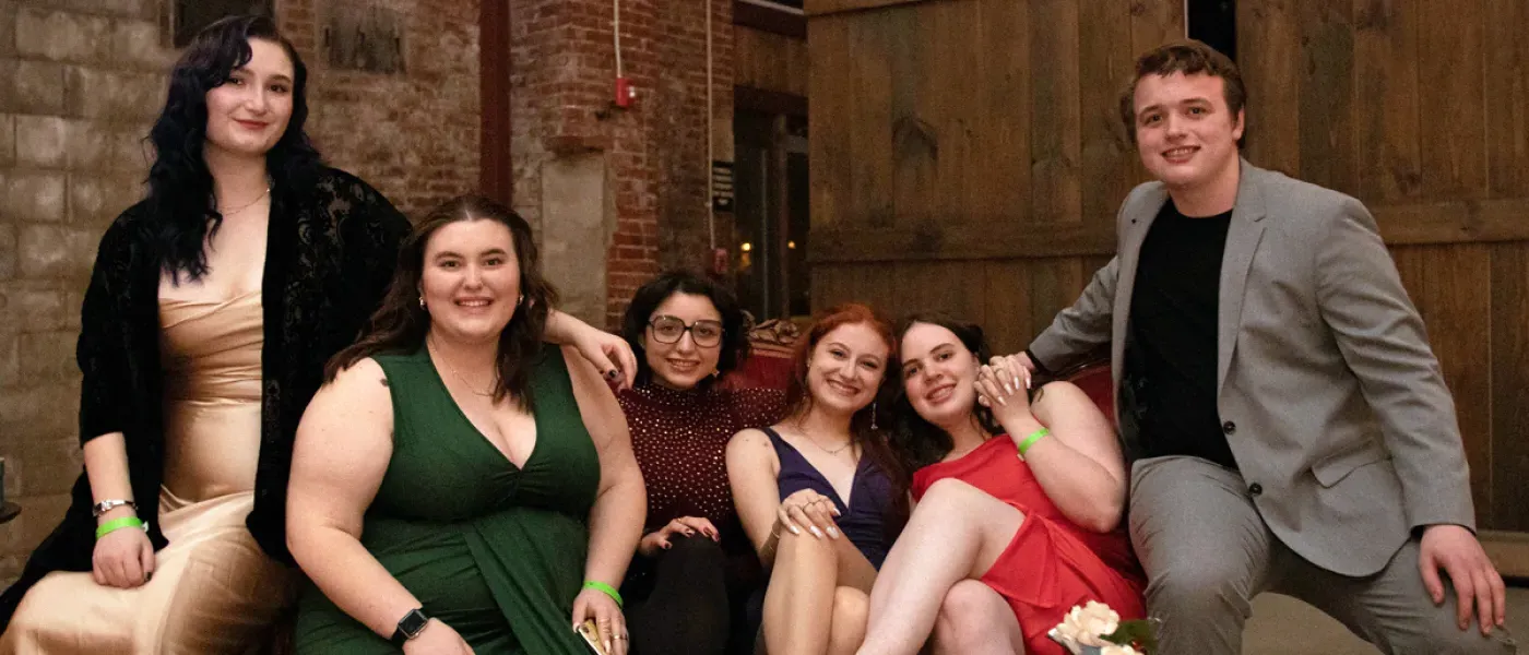 Six students sitting together at the Spring Dance